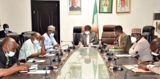 Honourable Minister of Labour and Employment, Dr Chris Ngige (middle); Permanent Secretary Federal Ministry of Labour and Employment, Dr Yerima Peter Tarfa (3rd left); General Secretary, Nigeria Medical Association (NMA), Dr Philip Ekpe (3rd right); President, Nigeria Association of Resident Doctor (NARD), Dr Dare Godiya Ishaya (2nd right), during the courtesy call of the association to the minister in Abuja