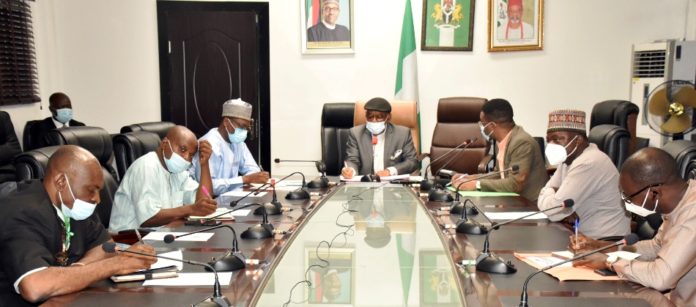 Nigeria Association of Resident Doctor (NARD) Honourable Minister of Labour and Employment, Dr Chris Ngige (middle); Permanent Secretary Federal Ministry of Labour and Employment, Dr Yerima Peter Tarfa (3rd left); General Secretary, Nigeria Medical Association (NMA), Dr Philip Ekpe (3rd right); President, Nigeria Association of Resident Doctor (NARD), Dr Dare Godiya Ishaya (2nd right), during the courtesy call of the association to the minister in Abuja