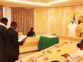 President Buhari swears in two INEC Commissioners