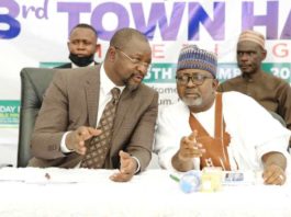 Hon Minister of Youth & Sports Devlpt. Mr Sunday Dare in a banter with the Permanent Secretary, Alhaji Ismail Abubakar during the TownHall meeting