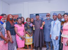 (4th Right) The Permanent Secretary,Federal Ministry of Humanitarian Affairs,Disaster Management and Social Development, Bashir Nura Alkali, (3rd Right) Director HRM Abdulrahman Babatunde Jaji, (2nd Right) SM Team Humanitarian Affairs, Kazim Adenekan, and Team members of the Ministry's Women Handball, during the Team's visit to the office of the Permanent Secretary to hand over the 1st Inter Ministerial Handball Competition, 1st position Trophy. On the 10th November, 2021. In Abuja.