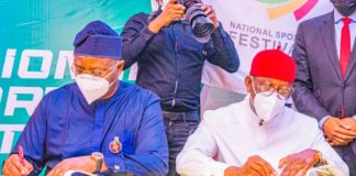 Hon. Minister of Youth and Sports Development, Chief Sunday Dare and Delta State Governor, Dr Ifeanyi Okowa sign MoU on National Sports Festival 2022 during the Extra Ordinary National Council on Sports Meeting in Asaba on Monday, 20th December, 2021