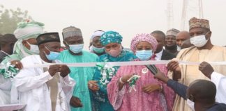 R-L Deputy Governor of Bauchi state, Senator Baba -Tela, Hon. Minister of state for Industry, Trade and Investment, Amb. Maryam y .Katagum cutting the tape, Hajiya Kulu Abba Kyari, Director, Soil Erosion and Flood Control Dept, Mr. Mathias Eluma (EPO), the chairman of Jama'are LGA, Hon., Samaila Yusuf Jarma, along with other dignitaries at the event.