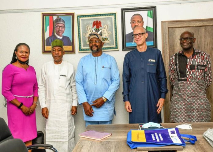 he Honourable Minister of Youth & Sports Development, Mr Sunday Dare (Middle), the representative of UNODC Dr Oliver Stolpe (2nd Right), Dr Akpan Ibanga (1st Right) & the Chief of Staff to the Hon. Minister Alhaji Abba Yola (2nd Left) & Amb. Mary Onyali (1st Left) in a group photograph after the visit of the UNODC to the Ministry
