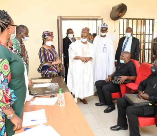 The Hon. Chairman of The Federal Civil Service Commission, Dr. Tukur Bello INGAWA being taken round the Accreditation centres for the 2021 Directorate Level Examination @ the Public Service Institute of Nigeria (PSIN), Kubwa- Abuja. On his right: Permanent Secretary of the Commission, Mrs. Monilola Udoh; On his Left: Director of Promotion Dept. Alhaji Sani Bello Torankawa
