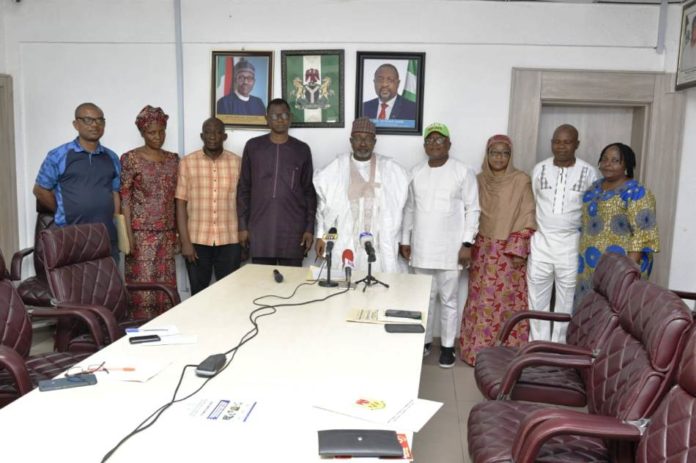Seven Boards of Para Sports Federation Ismaila Abubakar, Permanent Secretary Federal Ministry of Youth & Sports Devlpt; 4th right, Mr Peter Nelson, Director, National Sports Festival and Para Sports (NSF & PS) Department and others during the dissolution of the Seven Boards of Para Sports Federation today at the Permanent Secretary's Conference room in Abuja