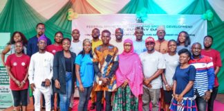 Representative of the Minister of Youth and Sports Development, Hajia Amina Dauren with some participants at the closing ceremony of a 3-day Voter Registration and Youth Mobilization Workshop on the Implementation of the ‘Not Too Young to Run Act’ held at the Public Service Institute of Nigeria, Abuja.