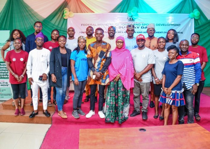 Representative of the Minister of Youth and Sports Development, Hajia Amina Dauren with some participants at the closing ceremony of a 3-day Voter Registration and Youth Mobilization Workshop on the Implementation of the ‘Not Too Young to Run Act’ held at the Public Service Institute of Nigeria, Abuja.