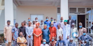 (2nd Row) (5th Left) The Representative of the Honourable Minster, Federal Ministry of Humanitarian Affairs Disaster Management and Social Development, Sadiya Umar Farouq, Director Special Needs Nkechi Onwukwe, (4th Left) Representative of the Permanent Secretary of the Ministry, David Onah, (6th Left) Representative of the Honourable Commissioner, Federal Ministry of Women Affairs and Social Development, Acting Permanent Secretary, Aleni Emmanuel Allenclay, (3rd Right) Consultant Bengner Engineering Ltd, Lanre Oloruntobe, and others, during the opening of the 3-day Capacity Building Worshop for Identified Local Producers of Assistive Technologies in the 36 States and FCT. On the 5th April, 2022. In Lokoja.