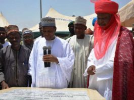 The representative of President Muhammadu Buhari, Minister of Defence, Maj Gen Bashir Salihi Magashi (M), Representative of Minister of Works and Housing, Arc. Solomon Labafilo (L), and the representative of the Emir of Kano, the Madakin Kano (R) at the Official Commissioning of the phase 1 of the National Housing Programme (NHP) in Fagge Local Government area of Kano State