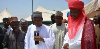 The representative of President Muhammadu Buhari, Minister of Defence, Maj Gen Bashir Salihi Magashi (M), Representative of Minister of Works and Housing, Arc. Solomon Labafilo (L), and the representative of the Emir of Kano, the Madakin Kano (R) at the Official Commissioning of the phase 1 of the National Housing Programme (NHP) in Fagge Local Government area of Kano State