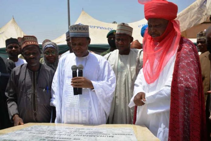 National Housing Programme (NHP) in Fagge Local Government area of Kano State11 The representative of President Muhammadu Buhari, Minister of Defence, Maj Gen Bashir Salihi Magashi (M), Representative of Minister of Works and Housing, Arc. Solomon Labafilo (L), and the representative of the Emir of Kano, the Madakin Kano (R) at the Official Commissioning of the phase 1 of the National Housing Programme (NHP) in Fagge Local Government area of Kano State