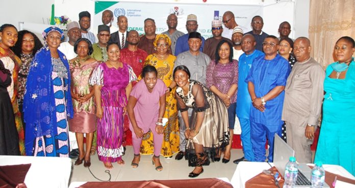 National Policy and the National Action Plan on the Elimination of Child Labour Ag Director, Inspectorate, Federal Ministry of Labour and Employment, Ajuwon Dauda (6th right); International Labour Organisation, Child Labour Desk Officer, Agatha Kolawole, (7th left) during a 3-day capacity building of zonal directors/state controllers on the use and application of the reviewed National Policy and the National Action Plan on the Elimination of Child Labour (2021 – 2025), Abuja
