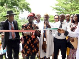 From left: Secretary, Ikot Esia Council of Chiefs, Chief Asuquo Ekanem; representative of the Minister of Niger-Delta Affairs, Arc, Ndukwe Ukpai; Vice Principal, African Church Secondary Commercial School, Chief Anthony Idobo and other stakeholders, during the inauguration of Block of six classrooms, Borehole, office Furniture and computers at Oku Iboku Community, Itu LGA of Akwa Ibom State, during the week