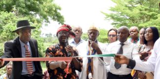 From left: Secretary, Ikot Esia Council of Chiefs, Chief Asuquo Ekanem; representative of the Minister of Niger-Delta Affairs, Arc, Ndukwe Ukpai; Vice Principal, African Church Secondary Commercial School, Chief Anthony Idobo and other stakeholders, during the inauguration of Block of six classrooms, Borehole, office Furniture and computers at Oku Iboku Community, Itu LGA of Akwa Ibom State, during the week
