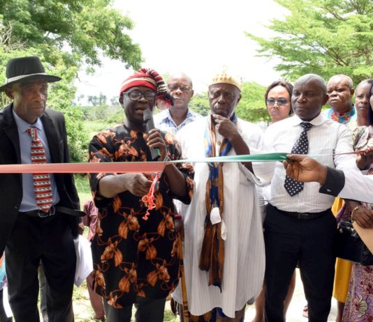 From left: Secretary, Ikot Esia Council of Chiefs, Chief Asuquo Ekanem; representative of the Minister of Niger-Delta Affairs, Arc, Ndukwe Ukpai; Vice Principal, African Church Secondary Commercial School, Chief Anthony Idobo and other stakeholders, during the inauguration of Block of six classrooms, Borehole, office Furniture and computers at Oku Iboku Community, Itu LGA of Akwa Ibom State, during the week