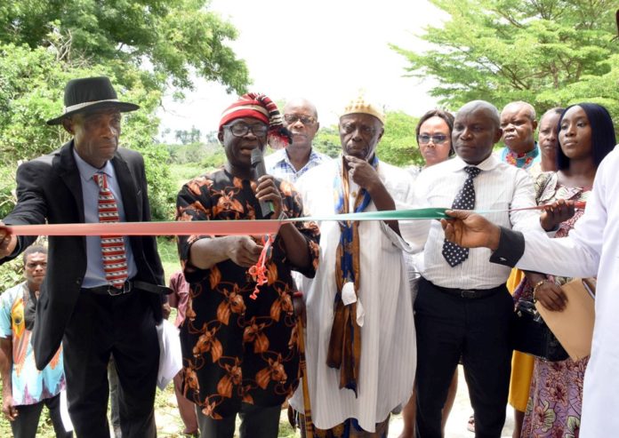 Pic 2. Ministry of Niger Delta Affairs inaugurates projects in Akwa Ibom From left: Secretary, Ikot Esia Council of Chiefs, Chief Asuquo Ekanem; representative of the Minister of Niger-Delta Affairs, Arc, Ndukwe Ukpai; Vice Principal, African Church Secondary Commercial School, Chief Anthony Idobo and other stakeholders, during the inauguration of Block of six classrooms, Borehole, office Furniture and computers at Oku Iboku Community, Itu LGA of Akwa Ibom State, during the week