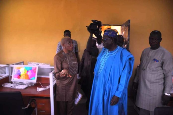 Senator Omotayo Alasoadura, listening to Arc. Joy Boderin while inspecting the facilities at Iju Utility Centre, Iju, Akure North L.G.A, Ondo State. Senator Omotayo Alasoadura, listening to Arc. Joy Boderin while inspecting the facilities at Iju Utility Centre, Iju, Akure North L.G.A, Ondo State.