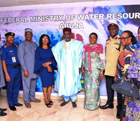 The Honorable Minister of Water Resources Engr Suleiman Adamu, flanked by the Permanent Secretary Mrs Didi Walson-Jack mni and some members of the planning committee who attended the inauguration physically. Other members joined virtually through zoom