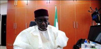 The Honorable Minister of Water Resources Engr Suleiman H Adamu delivering his Keynote address during the NINCID meeting Via Zoom