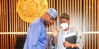 SGF, Boss Mustapha while conversing with Honourable Minister of Information & Culture, Alhaji Lai Mohammed during the inauguration of Inter-Ministerial Committee on 2022 Democracy Day celebration in his office