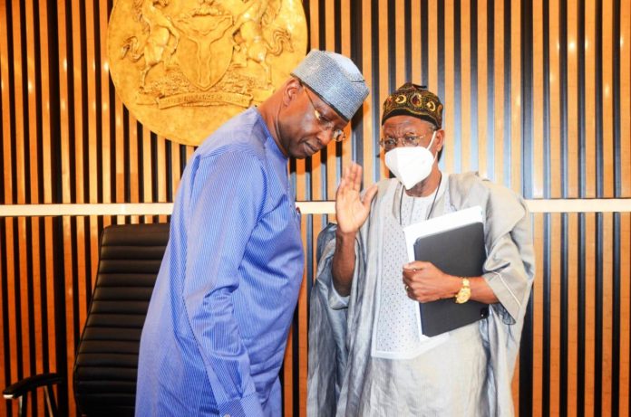 SGF, Boss Mustapha while conversing with Honourable Minister of Information & Culture, Alhaji Lai Mohammed during the inauguration SGF, Boss Mustapha while conversing with Honourable Minister of Information & Culture, Alhaji Lai Mohammed during the inauguration of Inter-Ministerial Committee on 2022 Democracy Day celebration in his office