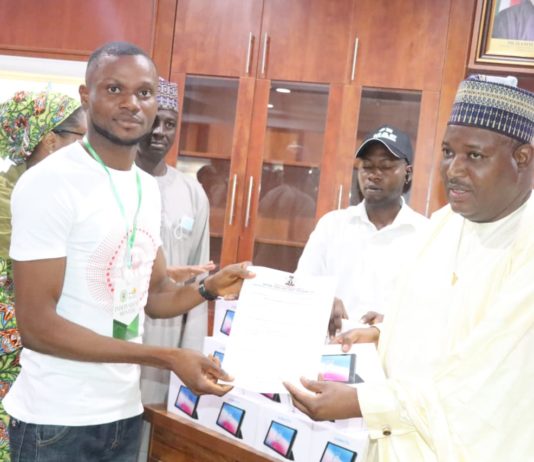 3rd Row: (5th Right) Representative of the Honourable Minister of Humanitarian Affairs Disaster Management and Social Development Dr. Nasir Sani Gwarzo, 4th Right :Representative of the Permanent Secretary, Director of Humanitarian Affairs, Alhaji Ali Grema, 6th Right, National Coordinator NSIP Engr. Umar Bindir and the Newly engaged Independent Monitors during the flag off /training of Stream 2 IMs on 9th June, 2022.