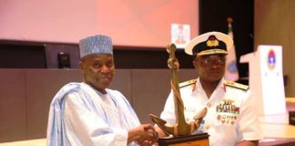 L-R - Maj Gen Bashir Salihi Magashi receiving accollade from the Chief of Naval Staff, Vice Admiral AZ Gambo