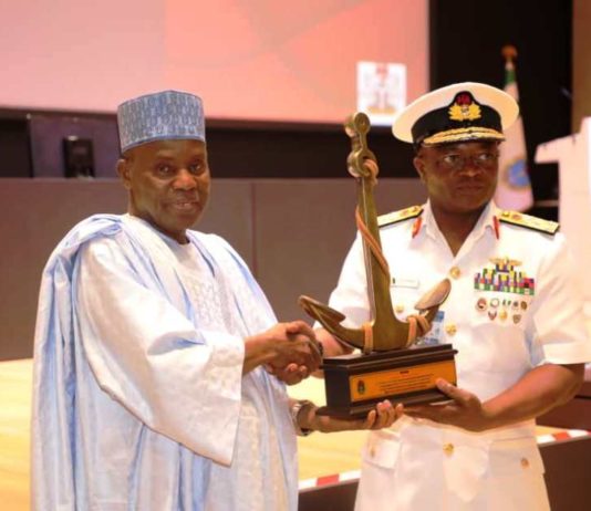 L-R - Maj Gen Bashir Salihi Magashi receiving accollade from the Chief of Naval Staff, Vice Admiral AZ Gambo