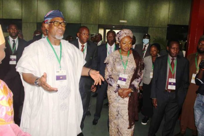 Minister of Mines and Steel Development, Arc. Olamilekan Adegbite The Minister of Mines and Steel Development, Arc. Olamilekan Adegbite (left), the Permanent Secretary, Ministry of Mines and Steel Development, Dr. (Mrs) Oluwatoyin Akinlade (right) during the Opening Ceremony of the First Nigeria- Africa Natural Resources and Energy Investment Summit (NAFNIS) held in Abuja on Wednesday, 1st June 2022.