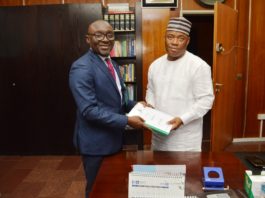 L-R. The Overseeing Director in the Office of the Permanent Secretary, MNDA, Mr. Alfred Abah and The new Permanent Secretary, Engr. Olusesan Adebiyi during the official handing over ceremony.