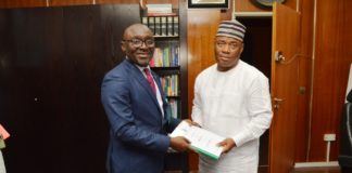 L-R. The Overseeing Director in the Office of the Permanent Secretary, MNDA, Mr. Alfred Abah and The new Permanent Secretary, Engr. Olusesan Adebiyi during the official handing over ceremony.