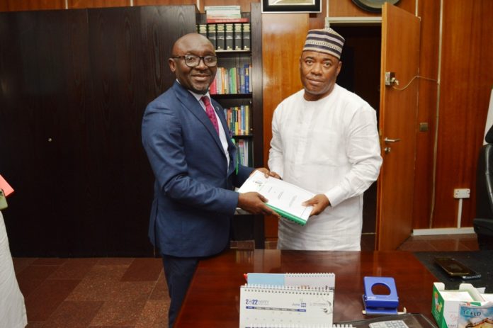 Mr. Alfred Abah and The new Permanent Secretary, Engr. Olusesan Adebiyi L-R. The Overseeing Director in the Office of the Permanent Secretary, MNDA, Mr. Alfred Abah and The new Permanent Secretary, Engr. Olusesan Adebiyi during the official handing over ceremony.