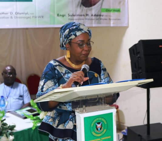 The Permanent Secretary Mrs Didi Walson-Jack mni delivering the Honourable Minister's address at the meeting