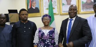 Permanent Secretary of the Ministry, Dr. Evelyn Ngige (centre), flanked to the right by the in-coming Executive Director, Sir. Charles Onyeka Okoye and to her left by the out-going Ag. Executive Director of Lagos International Trade Fair Complex, Mr. Francis Dajilek during the formal handing over ceremony in her Office, Abuja