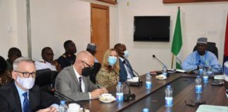 The Permanent Secretary, Ministry of Defence, Dr. Ibrahim Abubakar Kana, mni with the Director, Centre for Infectious Disease Control, Col. (Dr) Nelson Michael (Rtd)(1st left) and his team during a courtesy visit to Ship House, Abuja.