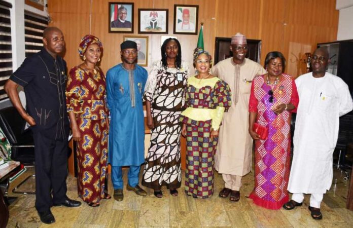Alumni Association of National Institute of Policy and Strategic Studies Permanent Secretary, Labour and Employment, Ms Kachollom S. Daju, mni (5th right); Chairman, Alumni Association of National Institute of Policy and Strategic Studies, Abuja Chapter, Dr Omobolanle Olowu, mni (4th right) with other executive members at the visit of the Association to the Permanent Secretary – Abuja