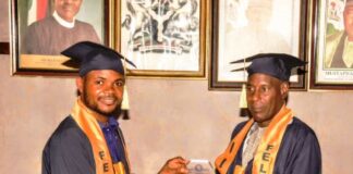 L-R, the Program Director, IIPM, Eburuche Banito, presenting Award to Permanent Secretary's representative, Mr. Ibrahim Bello, during Award ceremony in the Ministry.