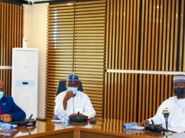 SGF, Boss Mustapha (R), DG NHIA, Prof. Mohammed Sambo (M) and WHO Country Representative to Nigeria, Dr. Walter Mulombo when the latter paid him a courtesy visit in his office