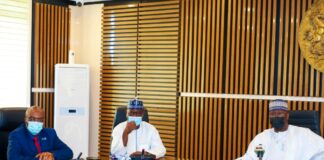 SGF, Boss Mustapha (R), DG NHIA, Prof. Mohammed Sambo (M) and WHO Country Representative to Nigeria, Dr. Walter Mulombo when the latter paid him a courtesy visit in his office
