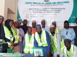 Representative of Hon. Minister of Labour and Employment, Ismaila Abubakar (5th right back); Head of the Training Institute, Idris Abubakar Saddiq (6th right back) with the trainees, in Gusau, Zamfara State