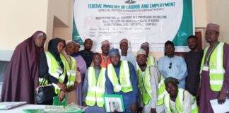 Representative of Hon. Minister of Labour and Employment, Ismaila Abubakar (5th right back); Head of the Training Institute, Idris Abubakar Saddiq (6th right back) with the trainees, in Gusau, Zamfara State