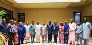 PS, GSO, Dr. Nnamdi Maurice Mbaeri (M), in a group photograph with Project Coordinator, Nigeria Digital Identification for Development (ID4D) Project, Musa Odole Solomon (6th R) and other officials from OSGF and ID4D