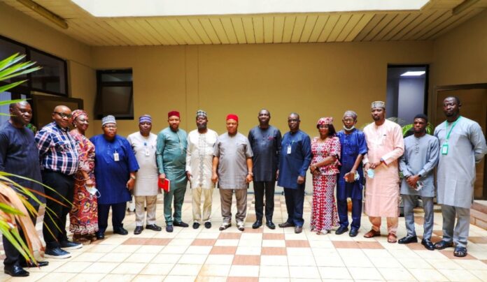 Group Photo-officials from OSGF and ID4D PS, GSO, Dr. Nnamdi Maurice Mbaeri (M), in a group photograph with Project Coordinator, Nigeria Digital Identification for Development (ID4D) Project, Musa Odole Solomon (6th R) and other officials from OSGF and ID4D