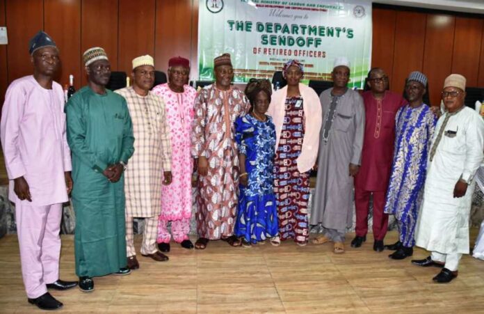 Permanent Secretary, Federal Ministry of Labour Permanent Secretary, Federal Ministry of Labour and Employment, Ms Kachollom S. Daju, mni (5th right); Head, Skills Development and Certification Department, Dr Tiza Chiila Shaakaa (5th left), and some of the retired officers of the department - Abuja