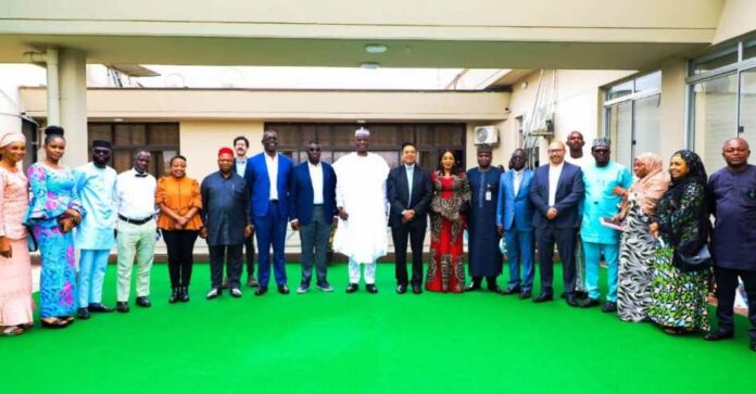 SGF, Boss Mustapha (10th L) in a group photograph with CEO, OGP (10th R) with his team and other officials from OSGF SGF, Boss Mustapha (10th L) in a group photograph with CEO, OGP (10th R) with his team and other officials from OSGF