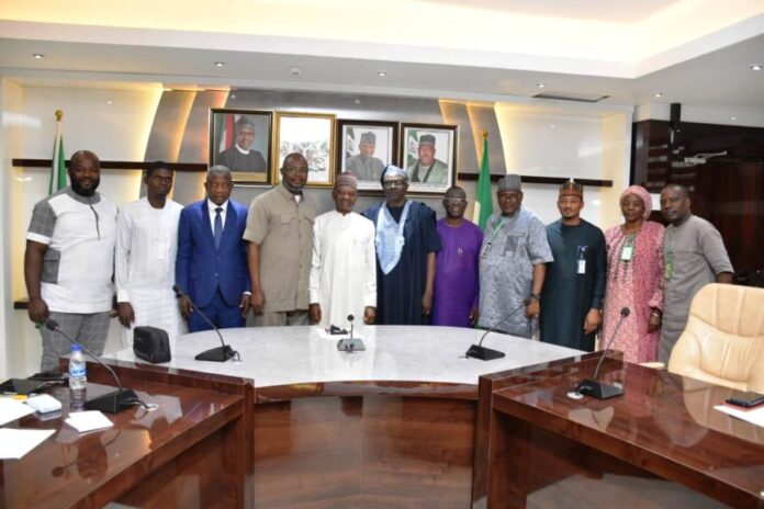Cashew Association of Nigeria The Minister of Agriculture and Rural Development, Dr. Mohammad Mahmood Abubakar ( C), on his right hand side,the President, Cashew Association of Nigeria, Hon. Ojo Ajanaku and by his left, President of African Cashew Alliance, Otunoba Babatola Faseru, during the courtesy visit in Abuja.