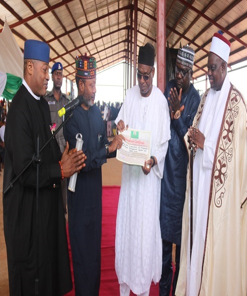 (Left) Director overseeing the office of the Permanent Secretary(EPO),Dr Famous Eseduwo, Honourable Minister of Environment, Barr. Mohammed Aliyu Ubandoma(Middle),Emir of Lafia, HRH, Retired Justice Sidi Bage in a photograph during the commissioning and handover ceremony at Angwan Rere, Local Government Lafia, Nasarawa state.