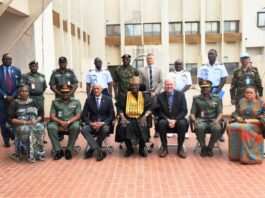 The representative of the Minister of Defence, Maj Gen Bashir Salihi Magashi, Dr. Abubakar Ibrahim Kana, mni (M) with the delegation of the United Nations Peacekeeping Strategic Partnership led by Major General Jai Menon (Rtd) (3rd L) and some staff of Ministry of Defence at Ship House, Abuja.