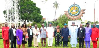 Hon. Minister of Science, Technology and Innovation, Dr. (Sen.) Adeleke Olorunnimbe Mamora (5th right), Director Chemical Technology Department, Federal Ministry of Science, Technology and Innovation, Mr. M.E.J BASSEY (4th right), Director-General, Federal Institute of Industrial Research Oshodi (FIIRO), Dr. (Mrs) Jummai Tutuwa Adamu (6th right), representative of FIIRO Board Chairman, Hon. Ajayi Nichoas (7th right), Director Finance and Account FIIRO, Mr. Oderinde Joshua Okeowo (3rd right), Director Chemical, Fibre and Environmental Technology Department FIIRO, Dr. Chima Igwe (2nd right), Director Biotechnology FIIRO, Dr. Lawal Kolawole (6th left), Director Planning FIIRO, Dr. (Mrs.) Bolanle Oyedoyin (3rd left), and Mr. Edike Ike Adoh-Ogbuta FIIRO Board Member (7th left), Deputy Director Press and Public Relation, Federal Ministry of Science, Technology and Innovation, Mr. Atuora O. Obed (left), and other Management Staff of FIIRO in a group photograph during the Official Visit of the Hon. Minister to the Institute today in Lagos